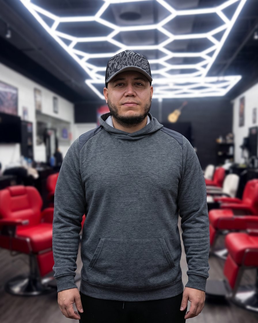Alex, barber at Jayuya Barbershop